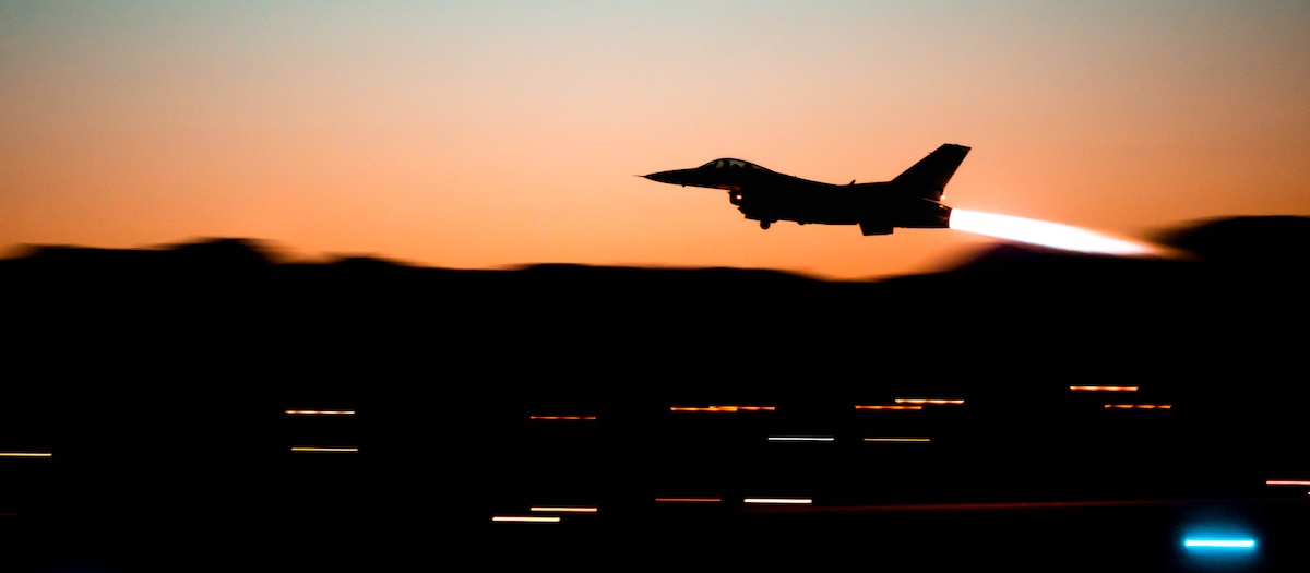 Belgian hangar at night